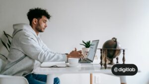 Effective HubSpot onboarding - man sitting at desk behind laptop.