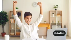 Marketing tips for startups - woman sitting behind laptop putting her hands up.