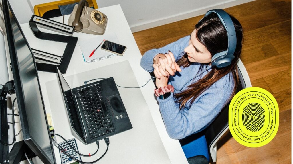 Woman at her computer researching google ads strategy
