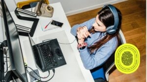 Woman at her computer researching google ads strategy