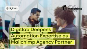 Two professionals collaborating on marketing automation at Digitlab, a certified Mailchimp Agency Partner, enhancing digital campaign strategies.