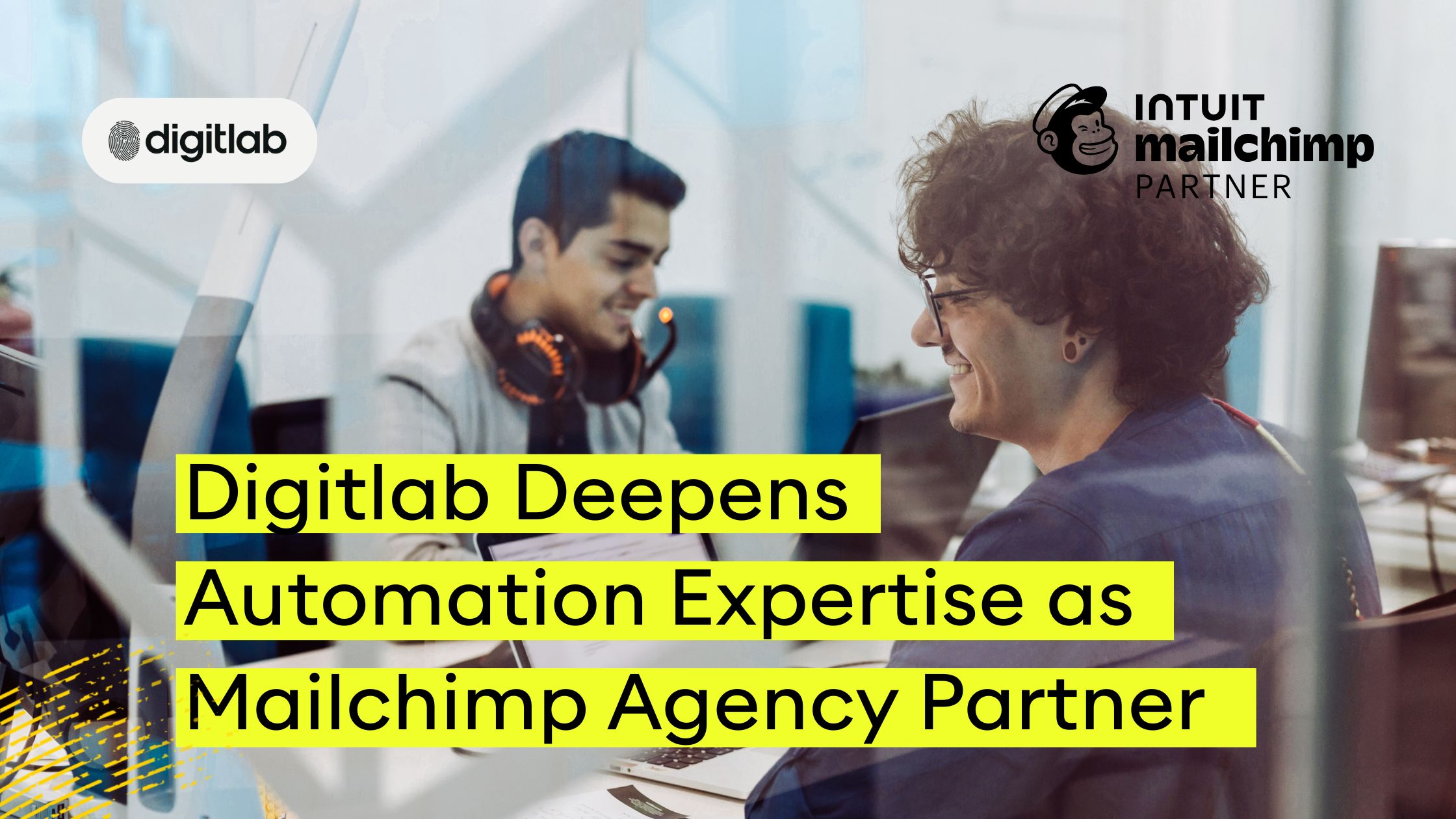 Two professionals collaborating on marketing automation at Digitlab, a certified Mailchimp Agency Partner, enhancing digital campaign strategies.