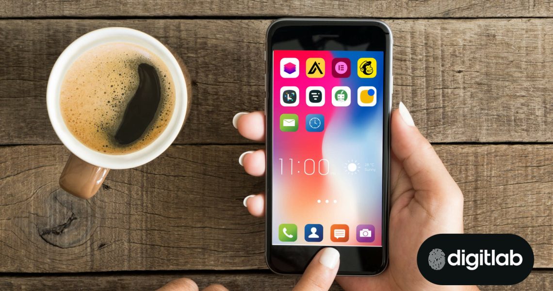 Powerful Tools Every Marketer Should Consider Adding to Their Toolkit - cellphone and coffee